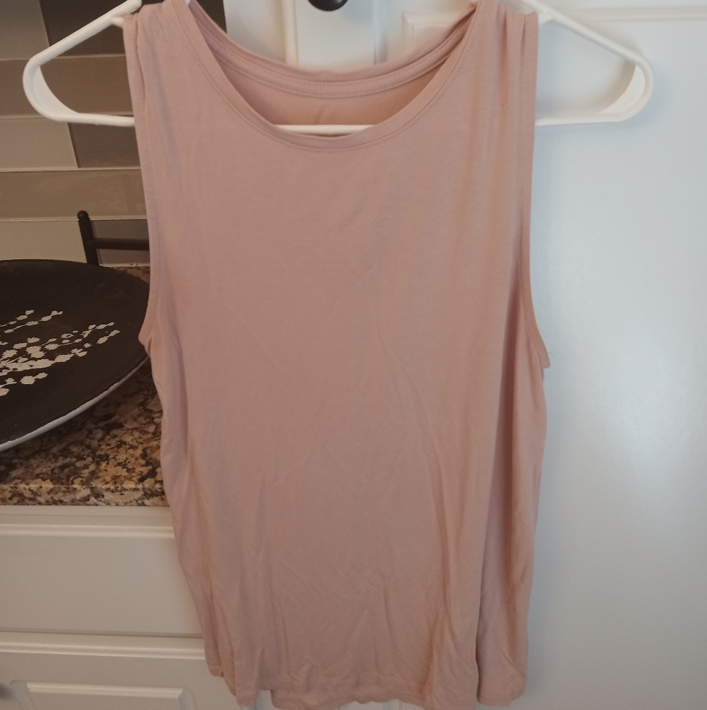 Womans loose fit sleeveless top